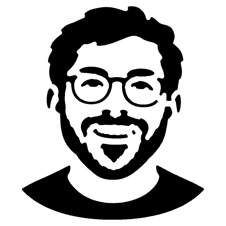 Black-and-white Challenging carving pattern of the man's face, glasses, and beard